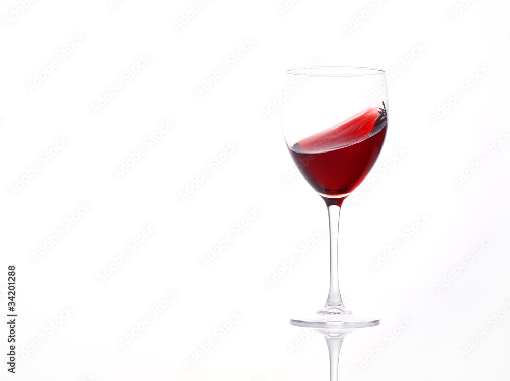 Isolated and moving red wine glass over a white background Isolated and moving red wine glass over a white background