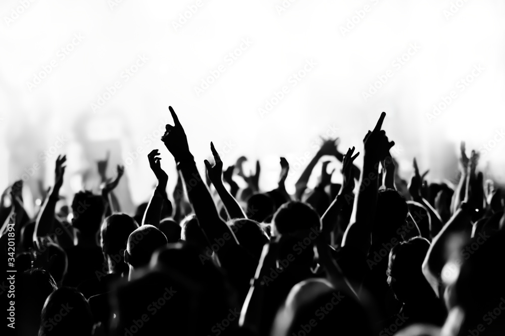 concert crowd in front of bright blue stage lights - obrazy, fototapety, plakaty 