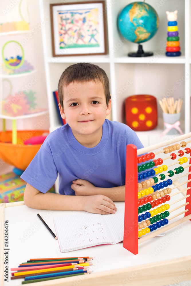 Fototapeta premium Boy preparing for elementary school