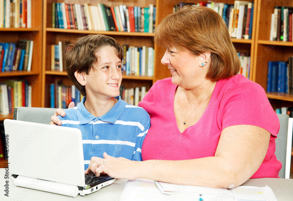 Fototapeta premium Mom and Son in Library
