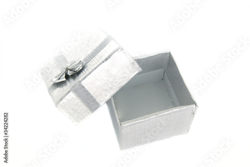 Open gift box over white