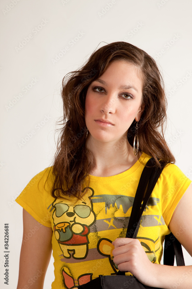 girl in yellow blouse looking at the camera girl in yellow blouse looking at the camera