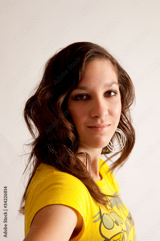 girl in yellow blouse smiling at the camera girl in yellow blouse smiling at the camera
