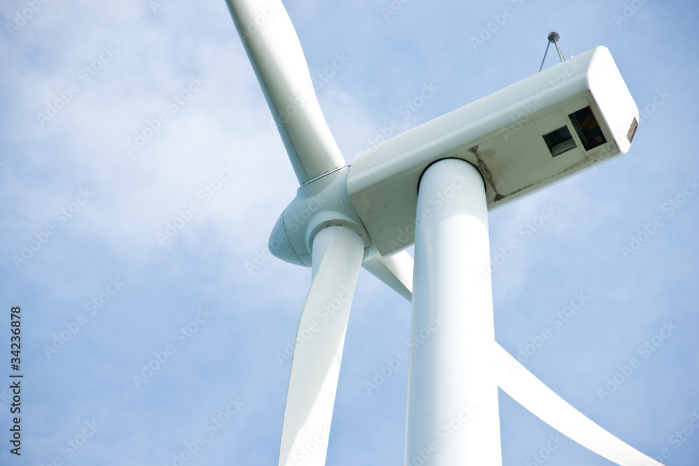 Photo of Wind power installation in sunny day Photo of Wind power installation in sunny day