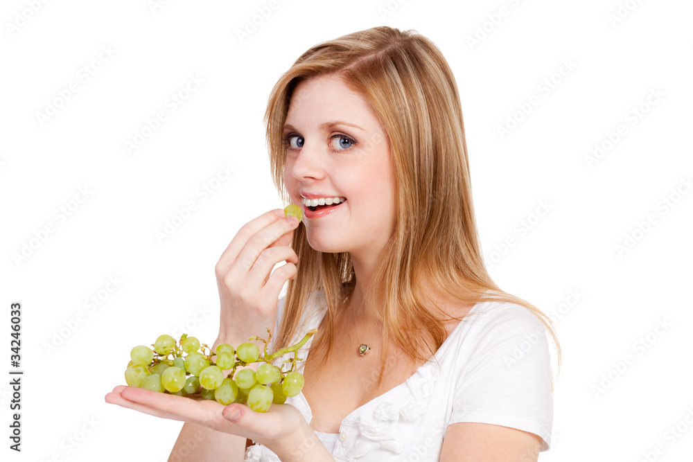 blonde junge frau isst weintrauben blonde junge frau isst weintrauben
