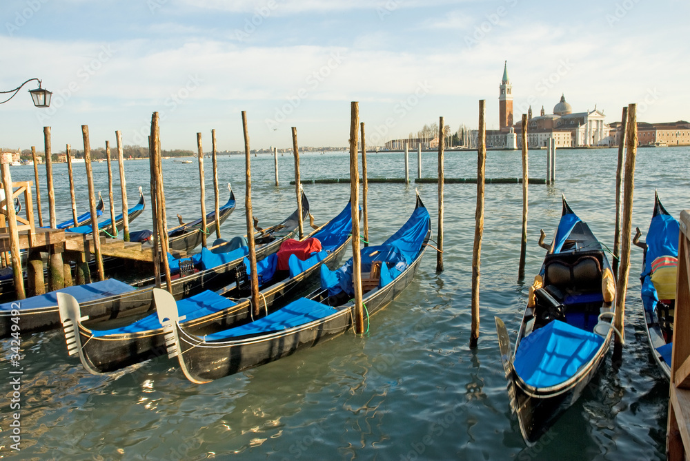 Italy, Venice gondola parking at sunset