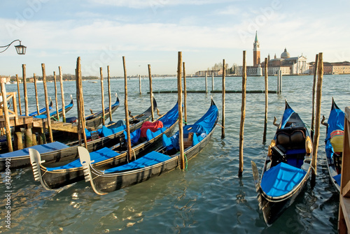 Italy, Venice gondola parking at sunset