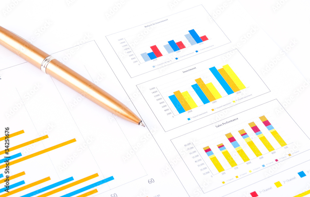 financial chart and pen financial chart and pen