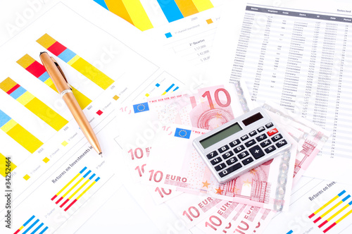 financial chart and datasheet. European money and pen.