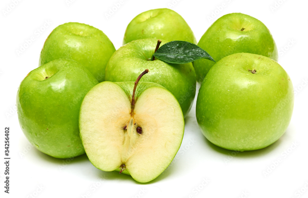 Green apple fruits and half of apple and green leaves Green apple fruits and half of apple and green leaves