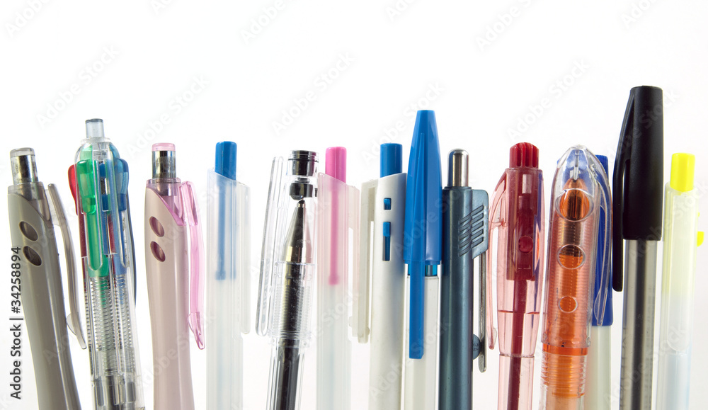 Group of pen stand in a row.