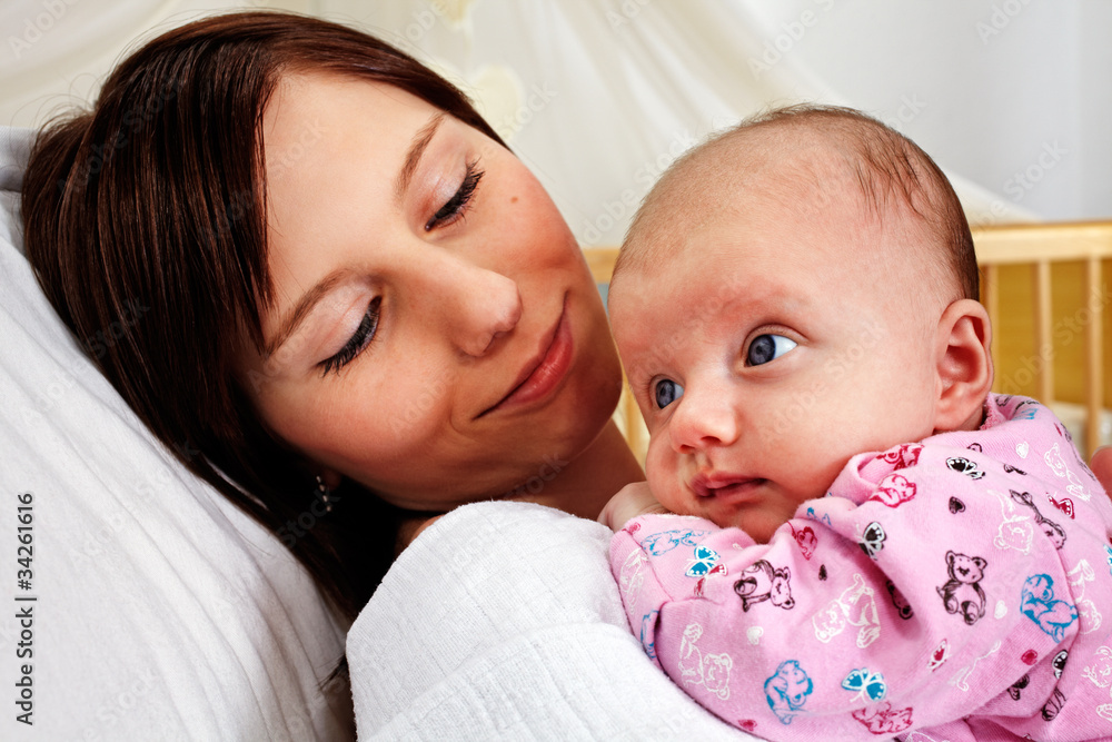 young mother with 7 week old baby young mother with 7 week old baby