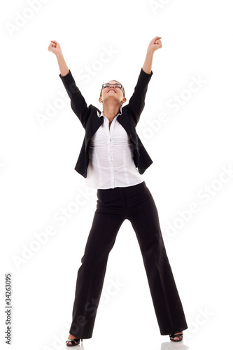 businesswoman with her arms raised