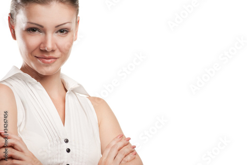 Happy young business woman with folded hand