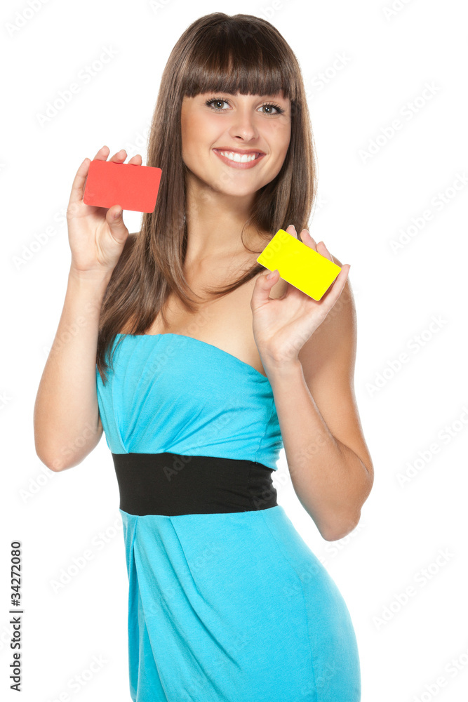 Happy female holding two plastic cards isolated on white Happy female holding two plastic cards isolated on white