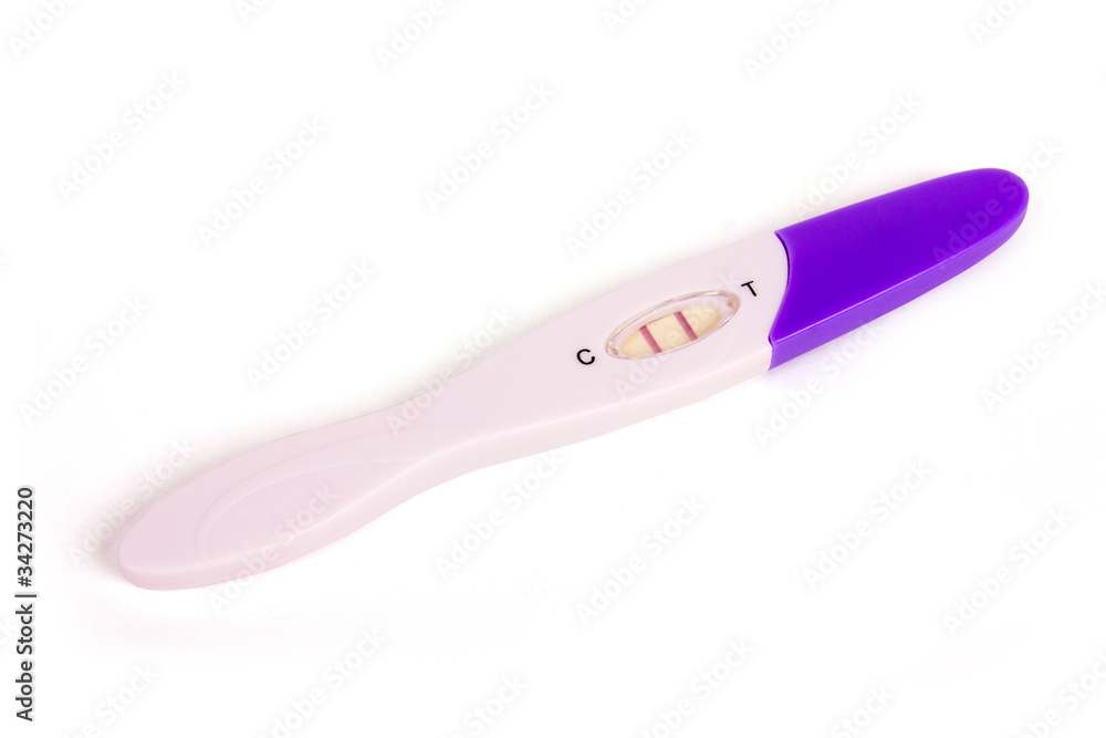 Positive pregnancy test over the white background Positive pregnancy test over the white background