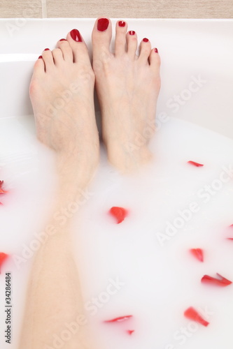 beautiful feet in milk bath