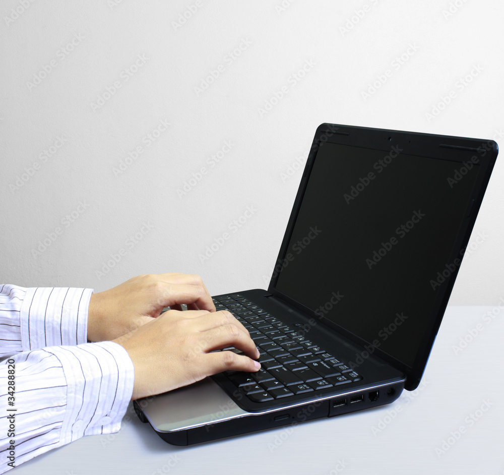 hands on the laptop keyboard hands on the laptop keyboard
