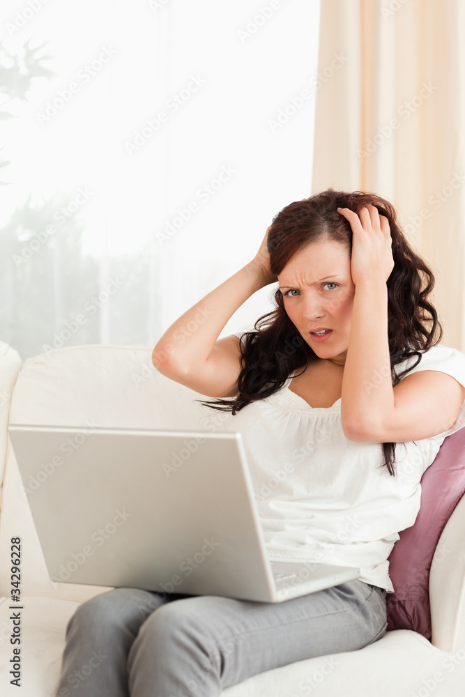 Frustrated young woman looking into the camera Frustrated young woman looking into the camera