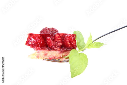 Raspberry Tart - a bite on a fork decorated with mint