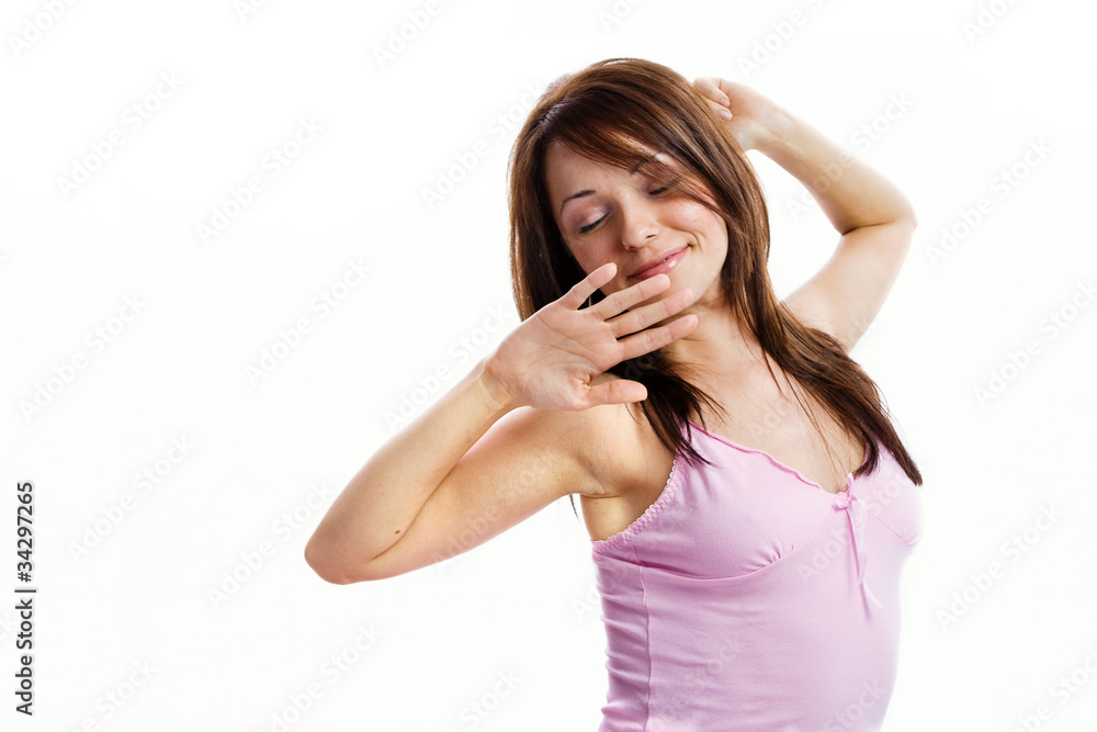 Young woman waking up and stretching, isolated on white Young woman waking up and stretching, isolated on white