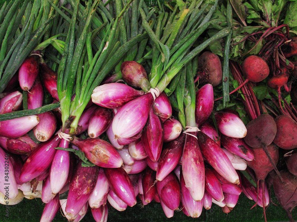 Agricultural background, a pile of organic onions. Agricultural background, a pile of organic onions.