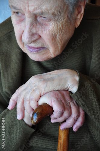 Εκτύπωση καμβά a senior person leaning on a wooden cane