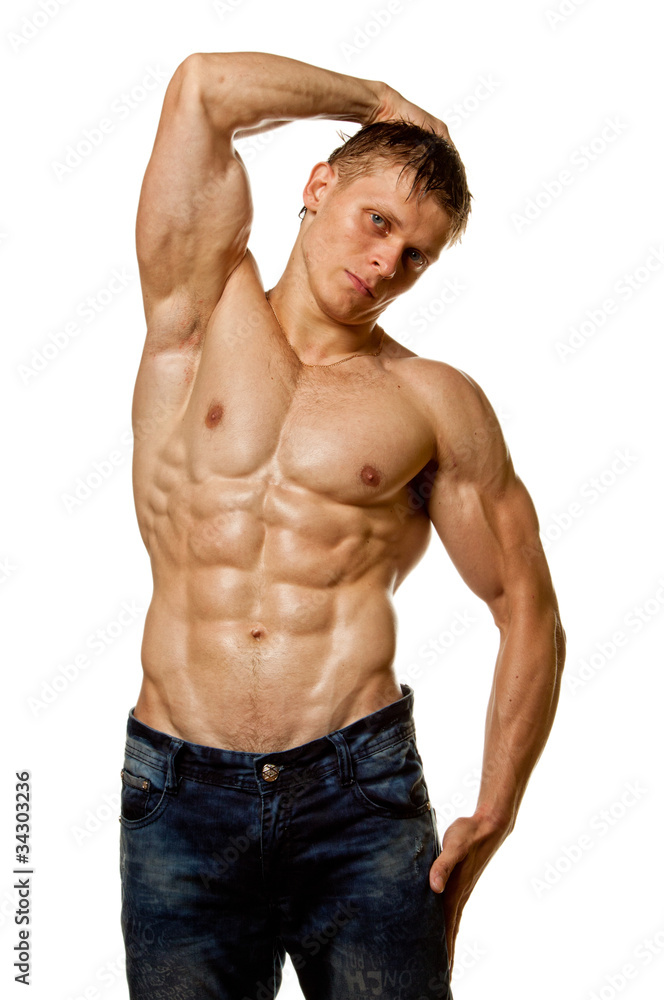 Muscle sexy wet naked young man posing in jeans Stock Photo | Adobe Stock