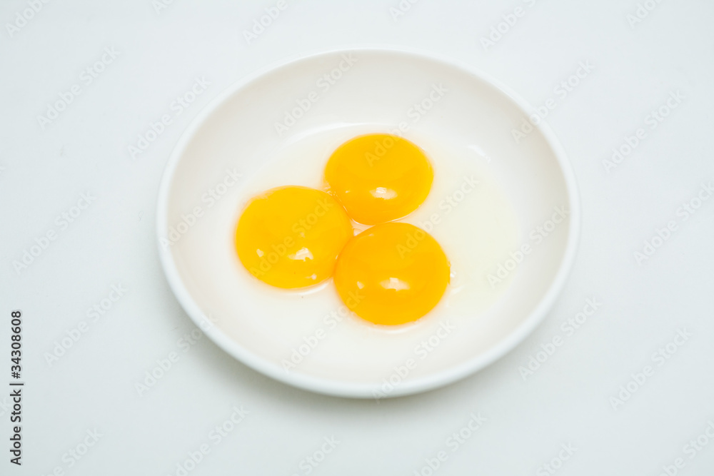 The appearance of three egg yolks The appearance of three egg yolks