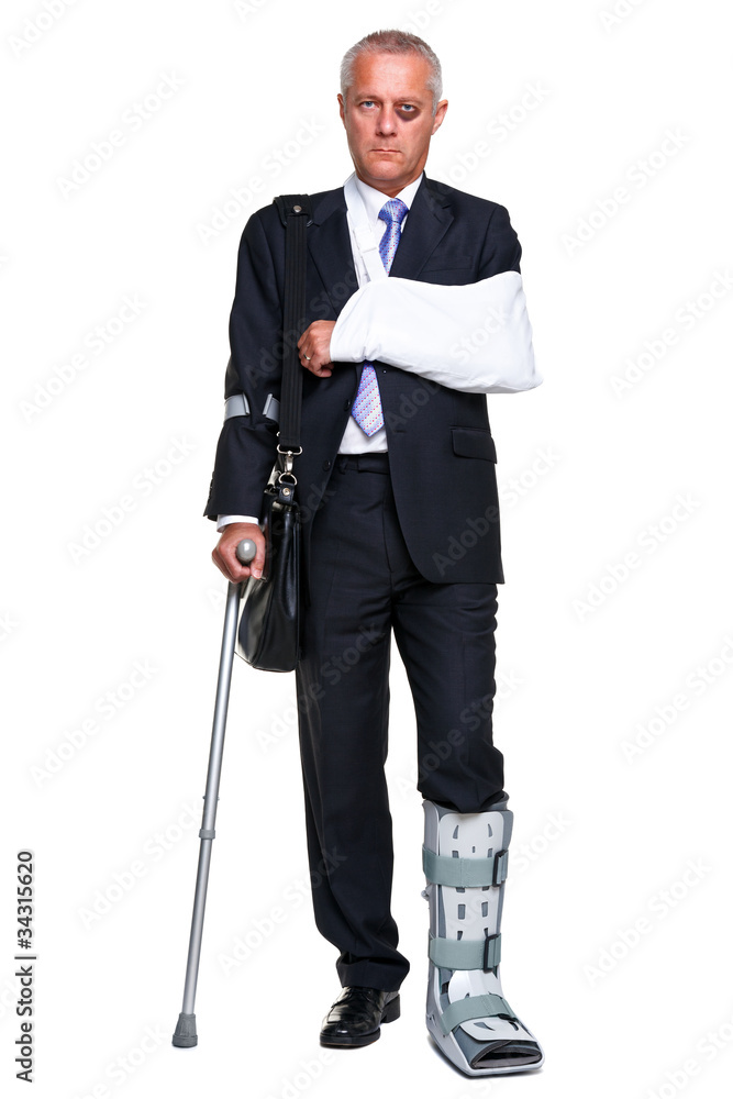 Injred businessman on crutches isolated on white Injred businessman on crutches isolated on white