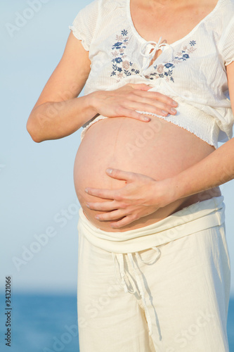 pregnant woman on beach