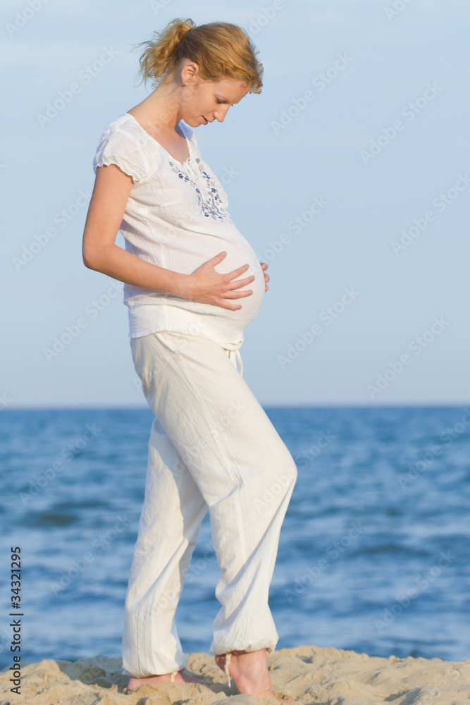 pregnant woman on beach