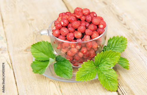 Strawberries in a glass bowl. photo