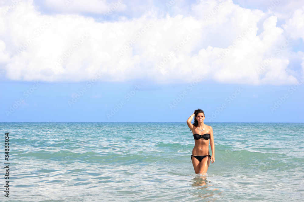 woman relaxing on the beach woman relaxing on the beach