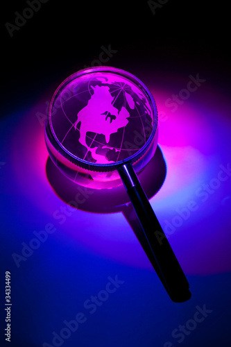 Globe and Magnifying Glass