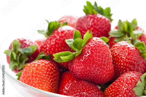 Rip strawberry on white background