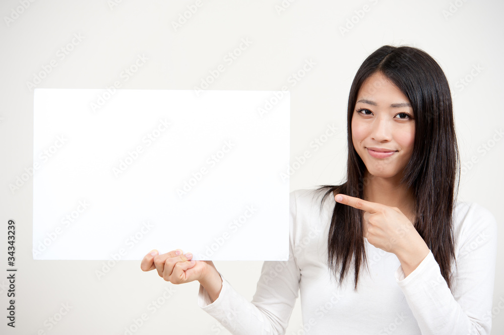 beautiful asian woman holding a blank whiteboad beautiful asian woman holding a blank whiteboad