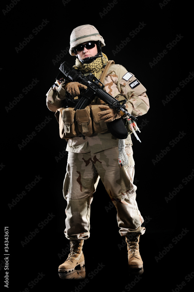 woman in military uniform with weapon woman in military uniform with weapon