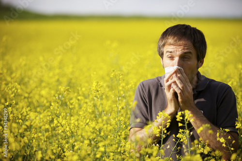 Man suffering from pollen allergy photo