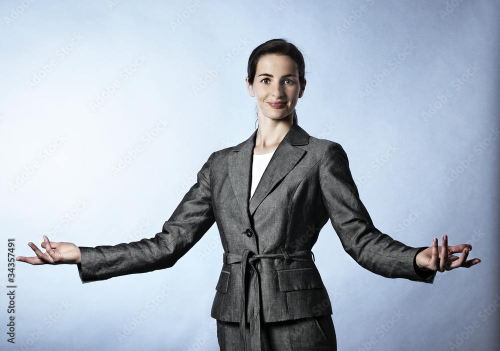 Business woman demonstrating a concept. Business woman demonstrating a concept.
