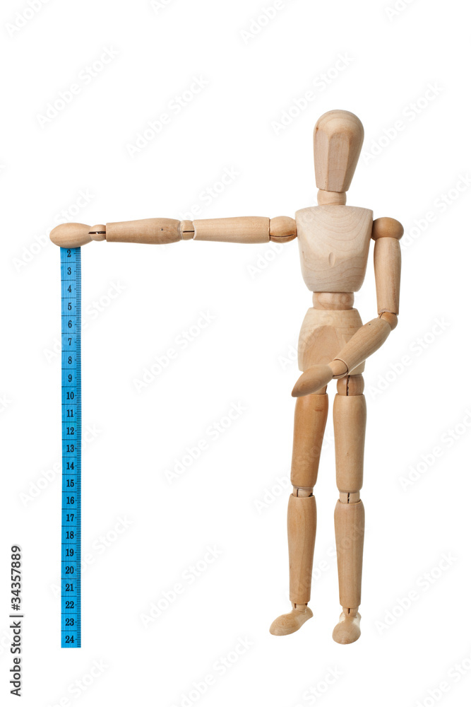Mannequin holding a measuring tape isolated on white Mannequin holding a measuring tape isolated on white