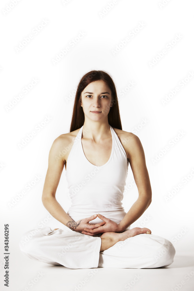 Woman in lotus Yoga posture (Padmasana) Woman in lotus Yoga posture (Padmasana)