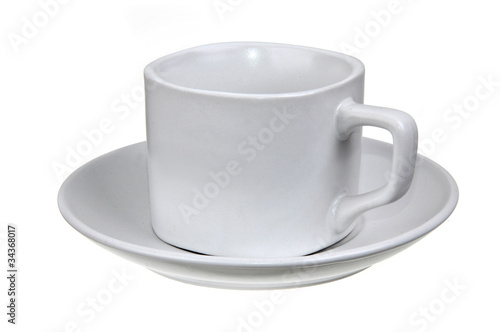 white coffee cup and saucer isolated on white