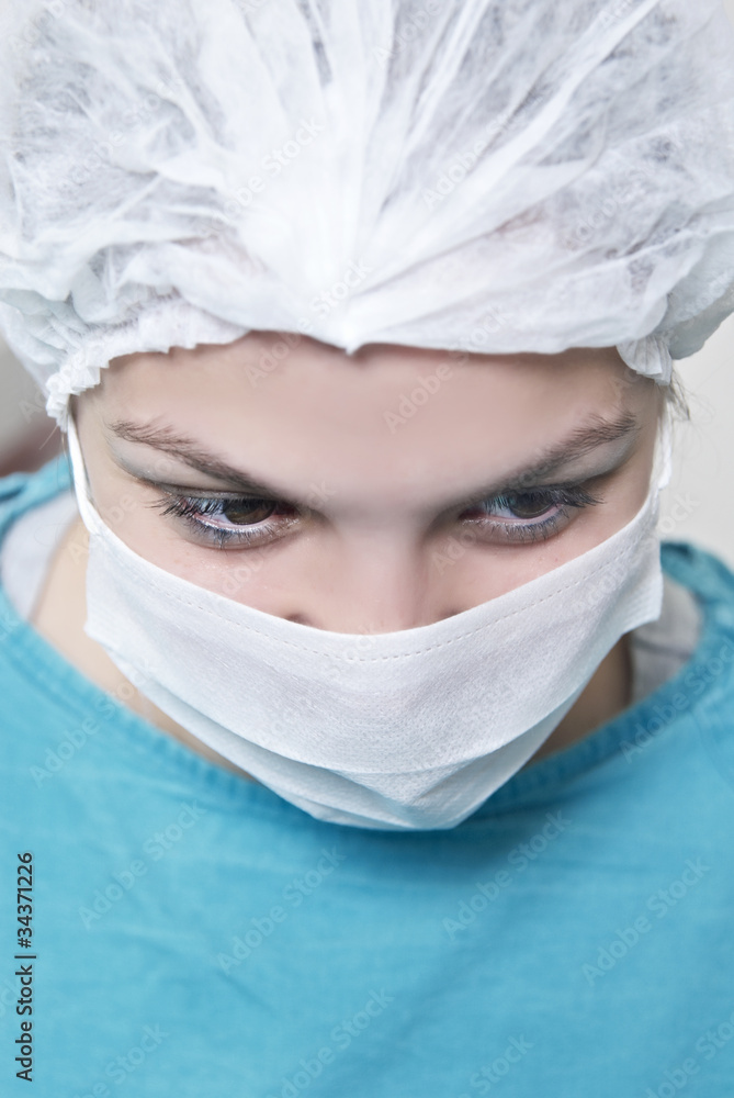 Surgeon working on patient Surgeon working on patient