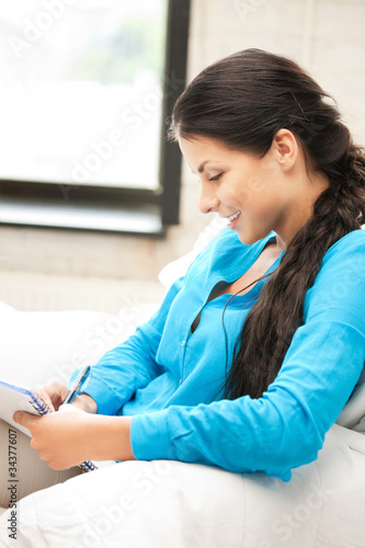 happy woman with big notepad Free Download happy woman with big notepad - GFXLoad