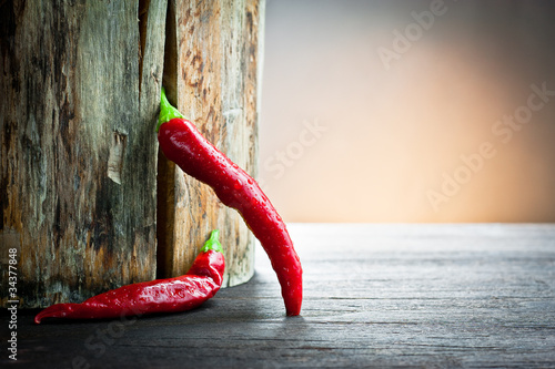 red hot chilli pepper on wood