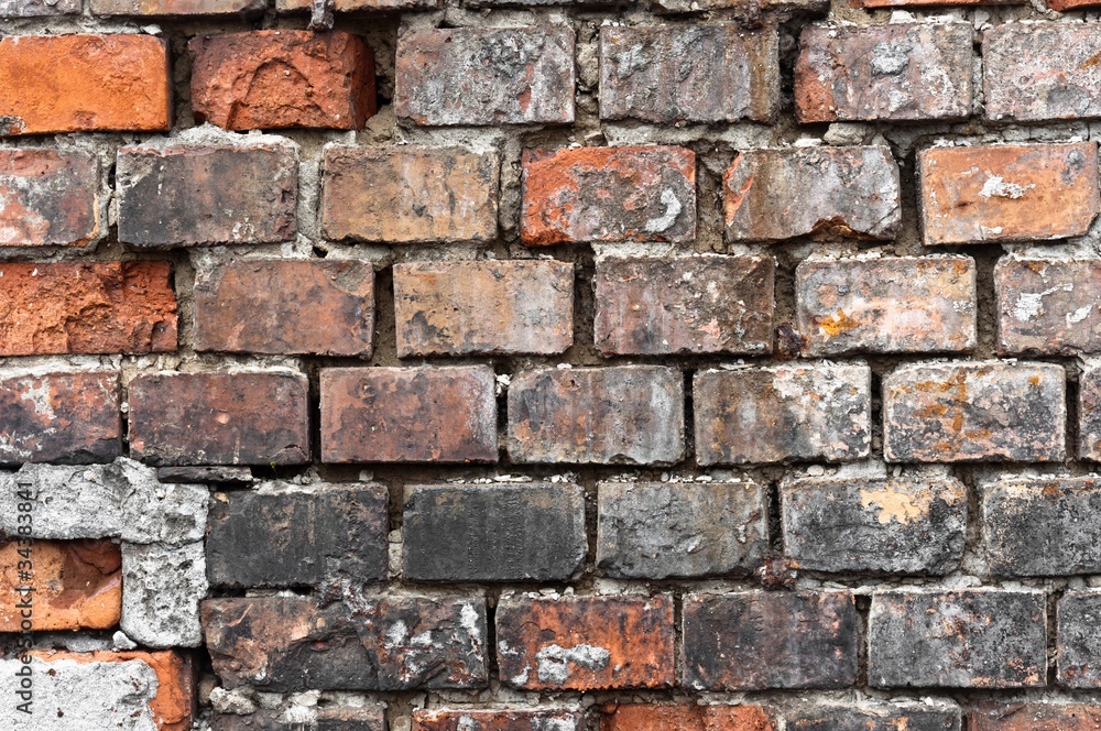 Fototapeta premium Abandoned brick wall texture