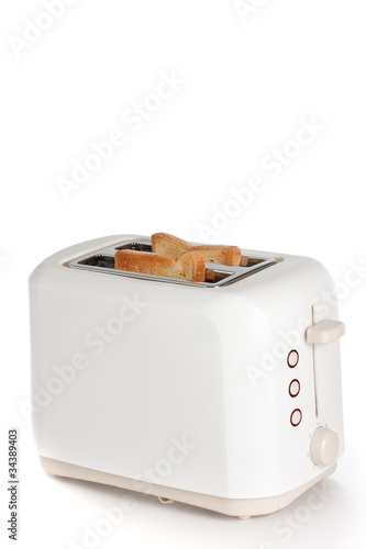 Modern toaster with bread slices