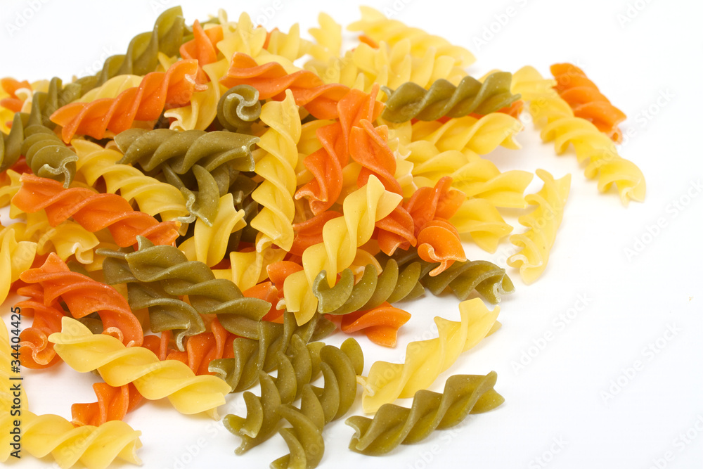 close up of a dried italian pasta on white background close up of a dried italian pasta on white background