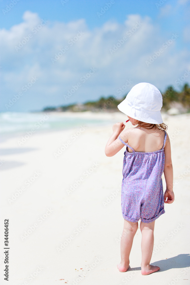 Little cute girl at beach